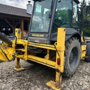foto New Holland B100C traktorbagr