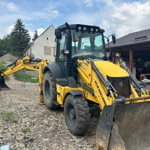 foto New Holland B100C traktorbagr